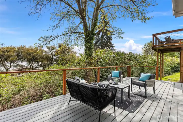 Your choice of outdoor living with an elevated deck off the dining room or a larger lower deck off the lower level rec room! Lots of nature to enjoy, from bunnies and ducks on the trail, to ospreys and eagles nesting in the trees!