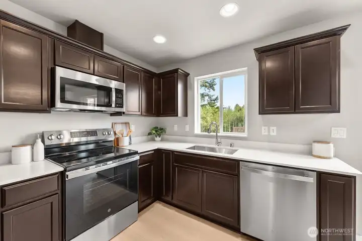 Image is a rendering. Photographs are for illustrative purposes only. Features, finishes, interior/exterior colors, landscaping and floorplan shown may vary from actual homes built