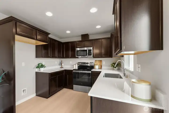 Image is a rendering. Photographs are for illustrative purposes only. Features, finishes, interior/exterior colors, landscaping and floorplan shown may vary from actual homes built