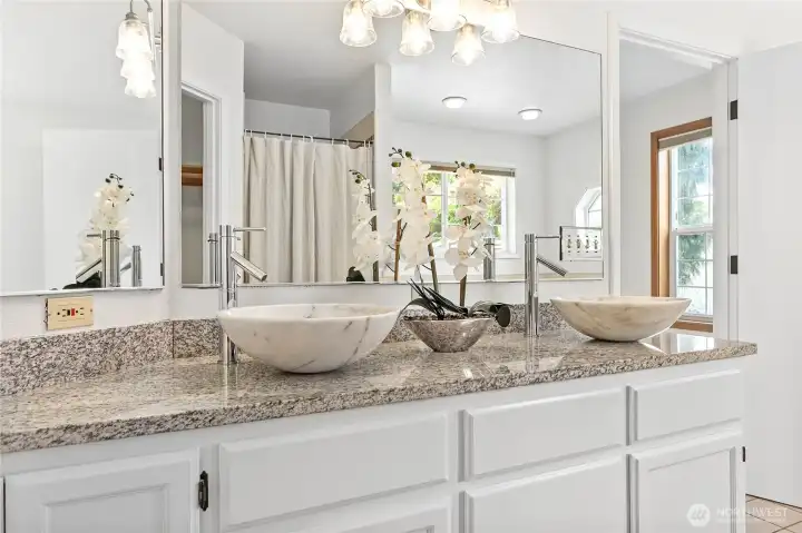 Enjoy this functional spa like primary bathroom