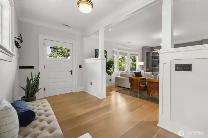 Blending elevated farmhouse warmth with classic Craftsman architecture, the home offers beautifully scaled living spaces filled with natural light, custom millwork, designer Visual Comfort lighting, built-in casework and cabinetry, and refined yet livable elegance with generous storage. Premium details abound, including solid brass and bronze hardware, Armac Martin cabinet hardware, and Rohl plumbing fixtures throughout.