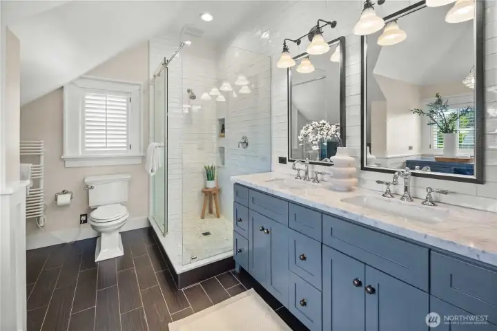 Generous bath featuring timeless finishes.