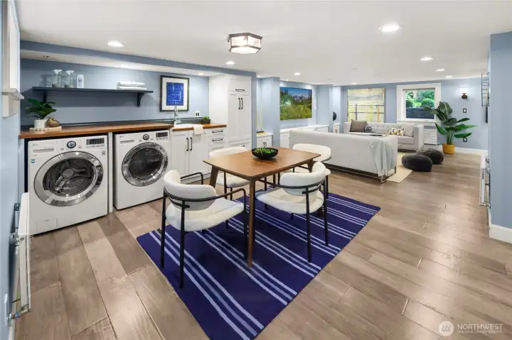 The lower level offers exceptional flexibility with a spacious rec room, third bedroom, ¾ bath, and laundry area—ideal for guests, media space, or work-from-home living.