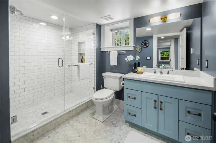 Lower-level lux bath.