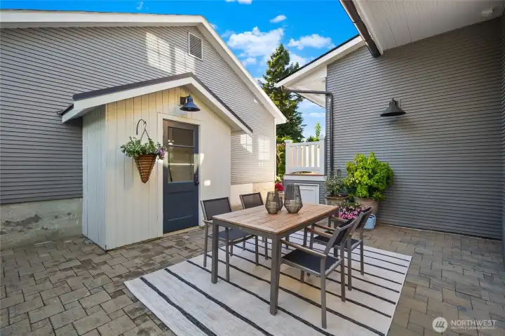 Sweet garden shed and cozy and private eating area.