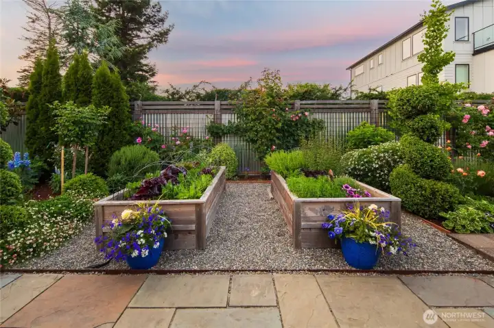 Impeccably maintained gardens and lush landscaping with an extensive drip system create a private retreat.