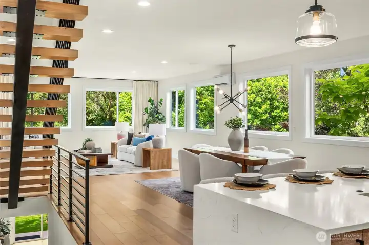 Open Floor Plan - Floating Staircase Accentuates the Main Floor Living Space Open Floor Plan - Floating Staircase Accentuates the Main Floor Living Space