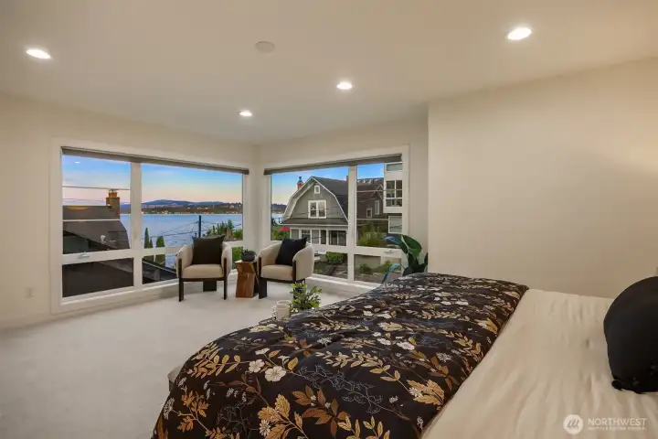 Primary Bedroom with a View of Lake Washington and the Mercer Island I-90 Bridge Primary Bedroom with a View of Lake Washington and the Mercer Island I-90 Bridge