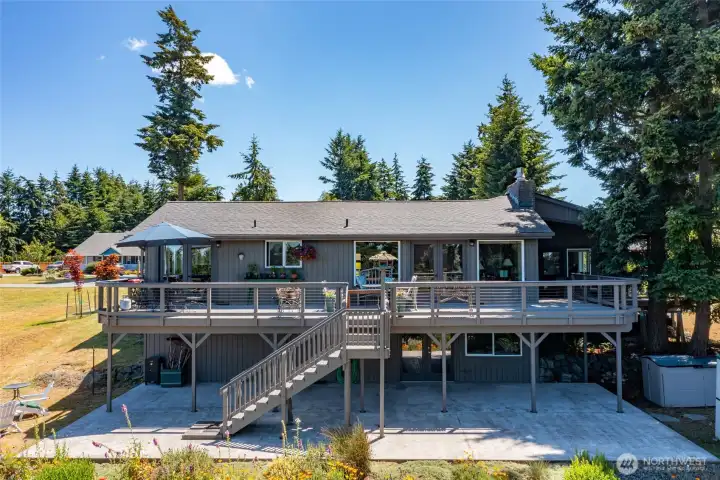 Large wrap around composite deck and daylight basement. Newer roof.