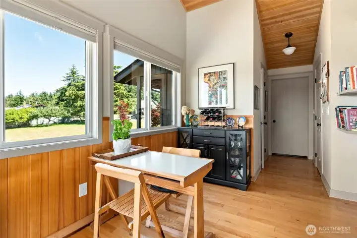 vertical wainscot wood paneling in breakfast nook