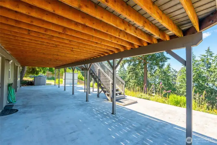 lower level patio area accessed from second primary and mud room