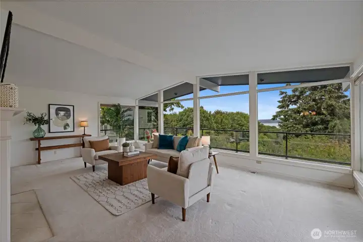Large living area offers great choices for your ideas on furniture layout with great anchor walls for artwork.