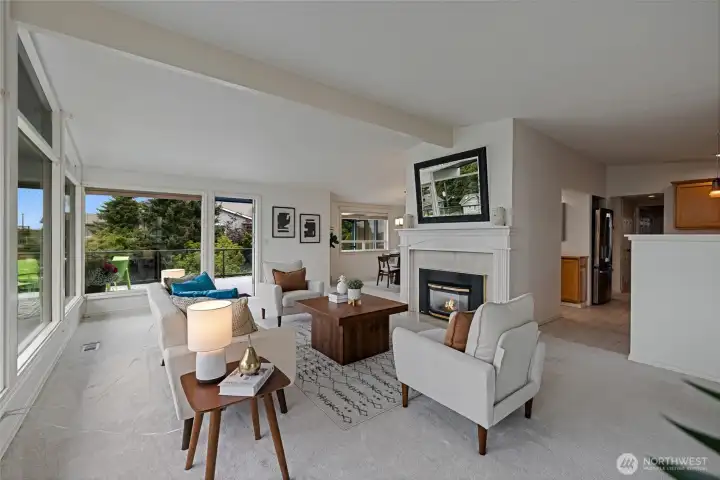 Great room opens to both the kitchen & the dining area.  Access to the deck for outdoor living.