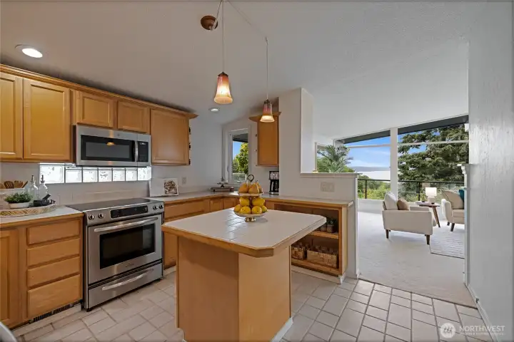 Kitchen with corner window with views open to the living area.