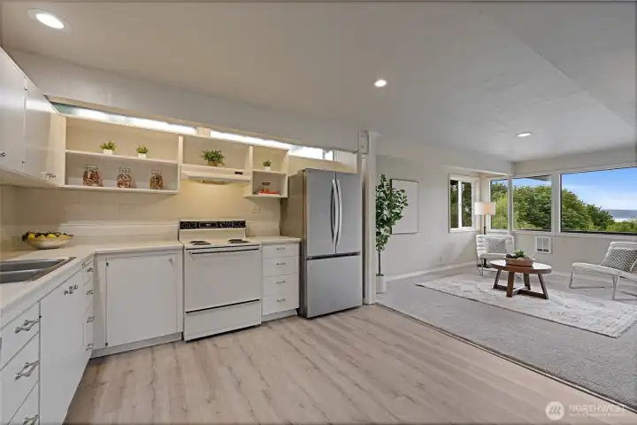 Lower level kitchen open to living area.