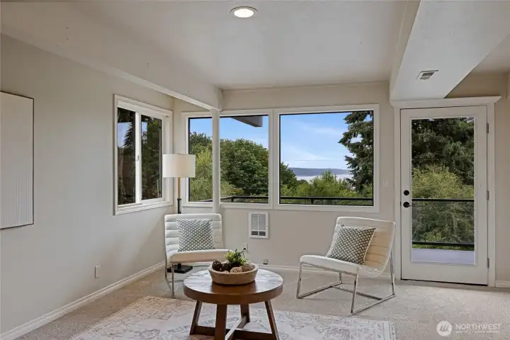 Sitting area downstairs with door to lower deck & Hot Springs Spa.