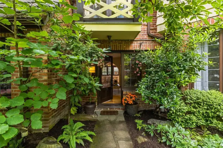 #3 welcoming front walkway. Hardwoods set the stage as you enter through your garden door.