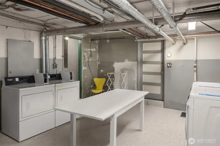 Extra storage is located on the basement level along with a workshop, bike and laundry room. The building is pet friendly and has warm radiator heat.