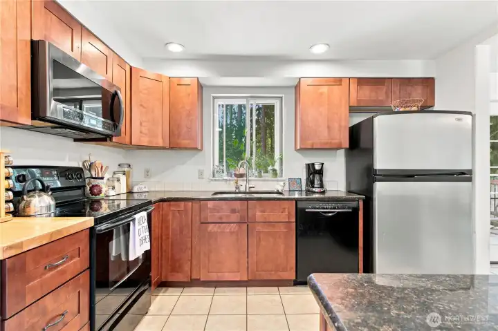 Newer cabinets and all appliances stay! Newer cabinets and all appliances stay!