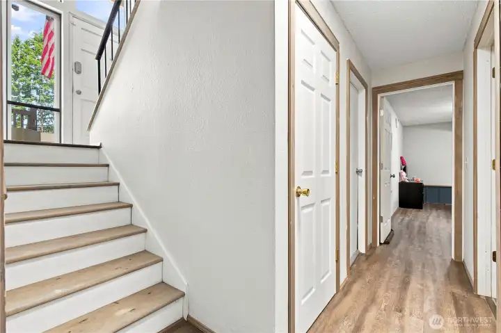 Straight ahead is the 4th bedroom, 3rd bathroom to the right, under-stair storage and access to the garage Straight ahead is the 4th bedroom, 3rd bathroom to the right, under-stair storage and access to the garage
