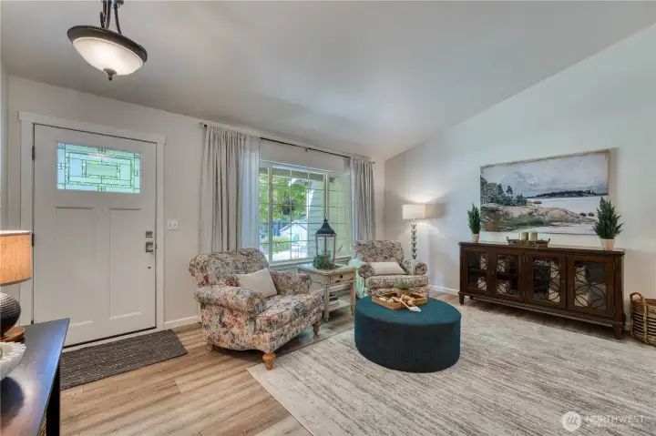 Magnificent floor plan and design featuring vaulted ceilings and LVP flooring.