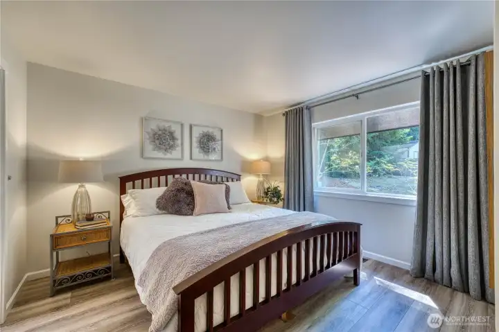 Primary suite features a walk-in closet and a full 3/4 bathroom.