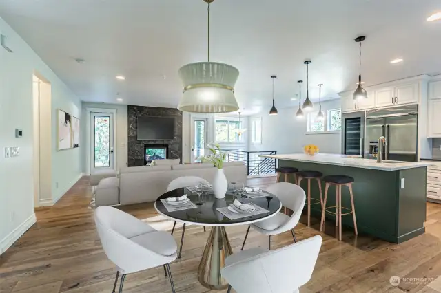 Lovely dining space is with a relaxing view of the backyard via the slider to the deck.