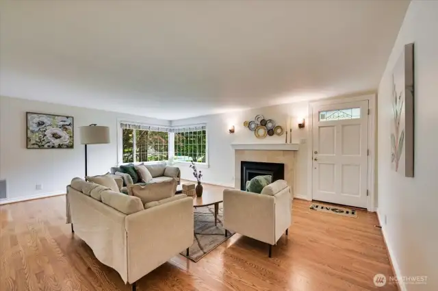 Living room - front door (right), gas fireplace