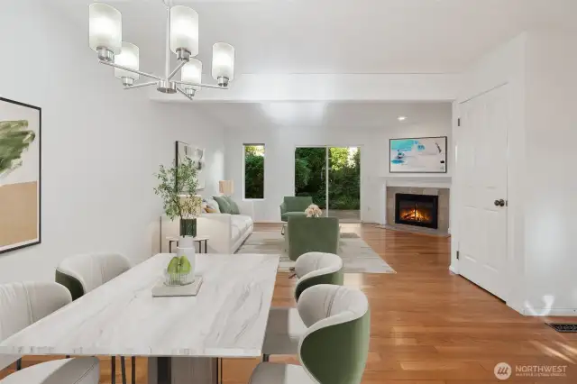 Dining area off kitchen with gleaming wood floors - Virtually staged to give you a sense of the potential! Fresh paint makes this move in ready!