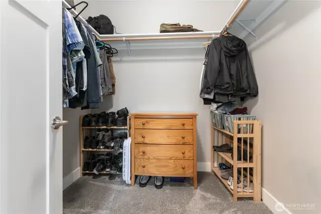 Walk-in closet in the main floor Primary Bedroom.