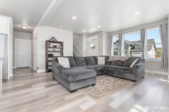 Hallway to the left leads to a large closet, guest bathroom and primary bedroom.