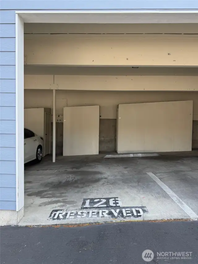 1 assigned covered parking & many unassigned spots available