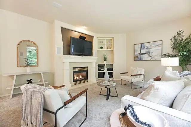 Bright and airy family room with custom surround sound and views to nature