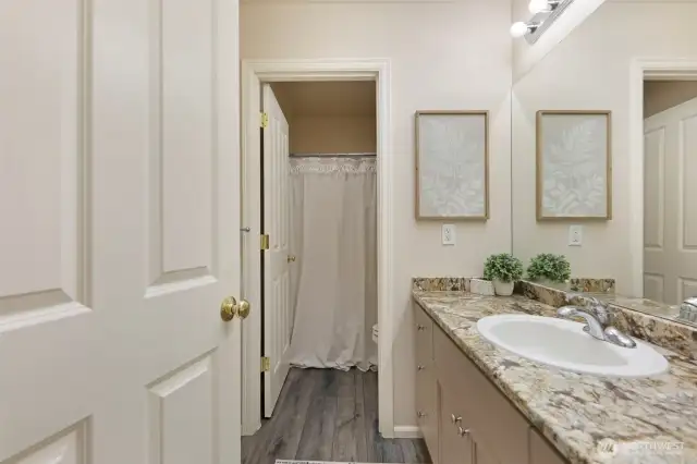 Spacious upstairs bathroom with separate shower & toilet room