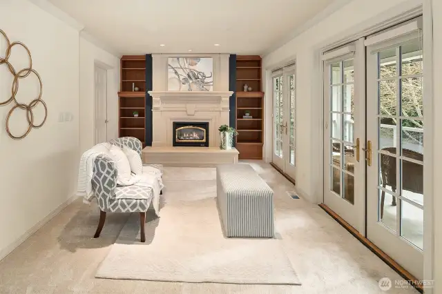 Primary Suite Sitting area with deck & FP