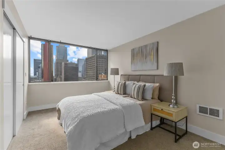 Wake up to panoramic city views from the