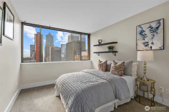Wake up to breathtaking city views right outside your window.