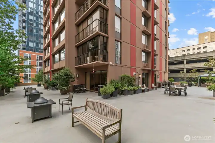 Expansive outdoor terrace with ample seating to enjoy fresh air and city views.