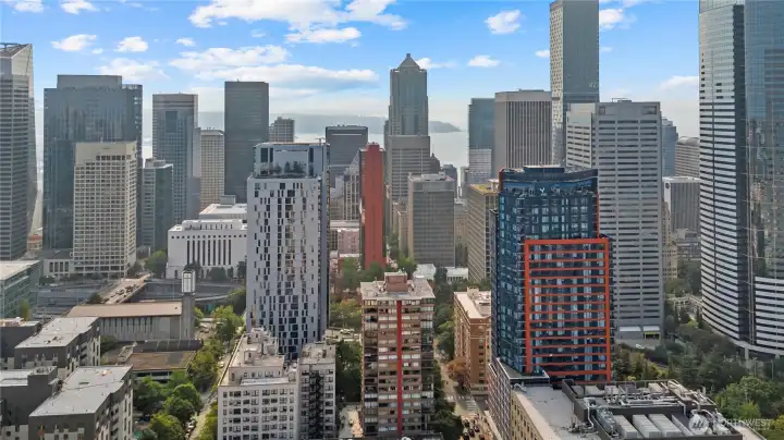 Aerial perspective capturing the skyline with glimpses of Seattle’s stadium district.