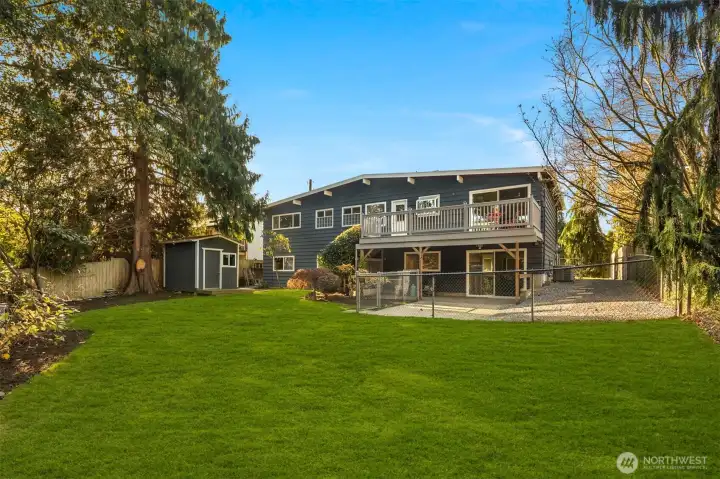 Spacious yard with fenced dog run
