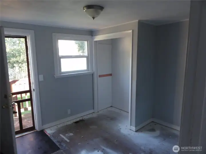 Bedroom 2 with access to back deck.