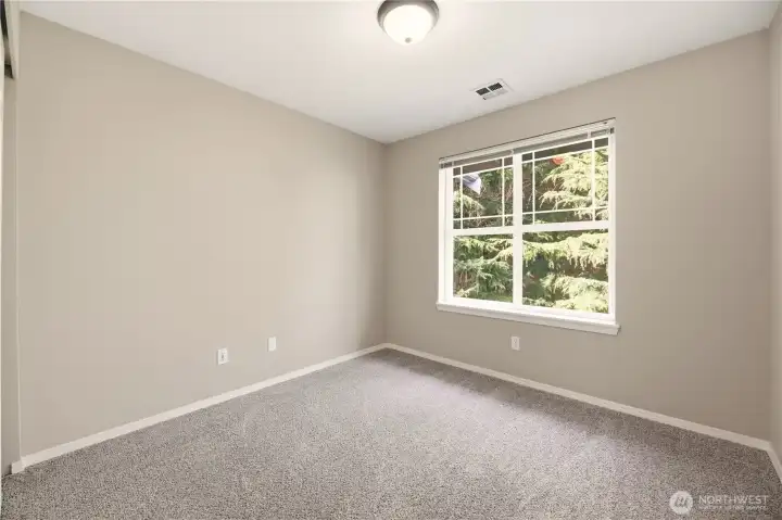2nd bedroom with greenbelt views