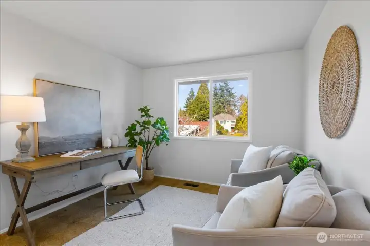 4th bedroom on the upper level staged as home office