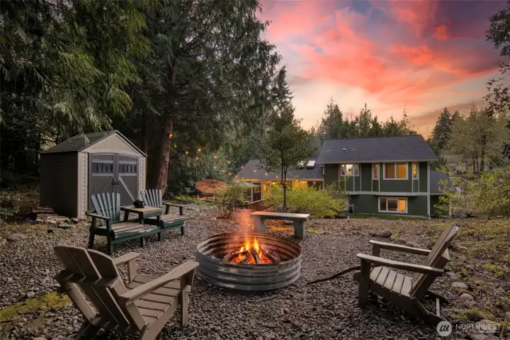 Spend your evenings around the fire ring, taking in sunset skies from this inviting backyard seating area.
