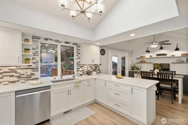 The open kitchen layout keeps you connected to the dining and living spaces, perfect for gathering, hosting, and staying part of every moment.