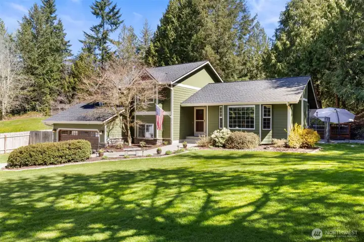 Enjoy the quiet of a well-established neighborhood, where mature trees and natural beauty create a sense of calm and privacy.