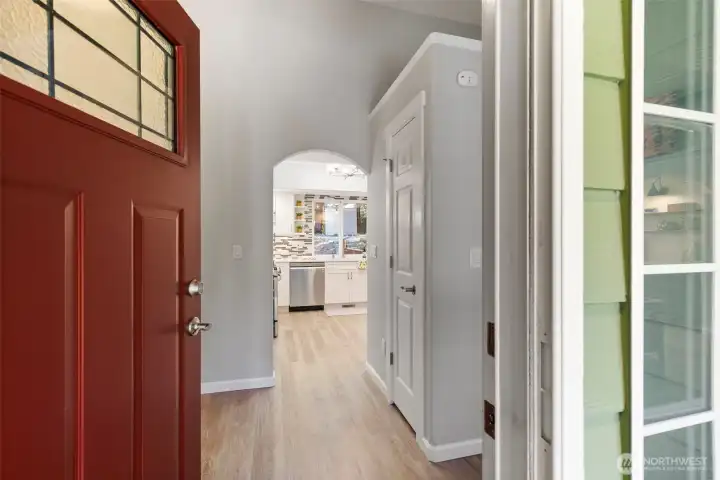 Step into an inviting entry where a statement front door sets the tone for a warm, welcoming experience.