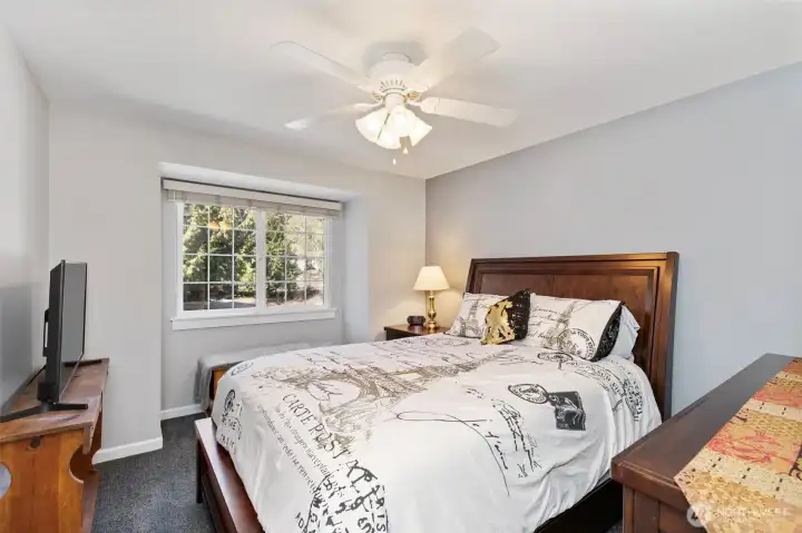 A bright, versatile second bedroom, perfect for guests, or whatever your lifestyle needs.