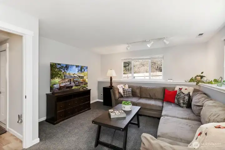 Create your own retreat in the expansive lower-level living area—ideal for movie nights, game days, or simply unwinding.