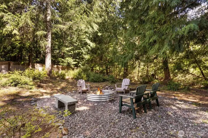 At the top of the path, your private firepit lounge awaits, warm, inviting, and ready for you.